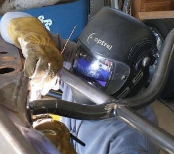 Tig Welding a GM A body frame reinforcement kit onsite for a client.